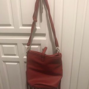 Faux red leather fringe purse